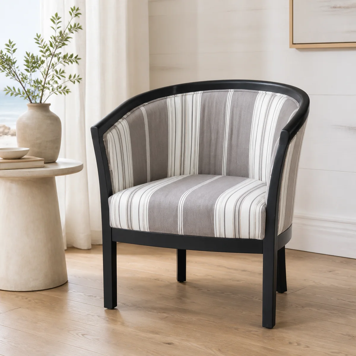 Coastal Stripe Tub Chair staged in a curated room setting one.