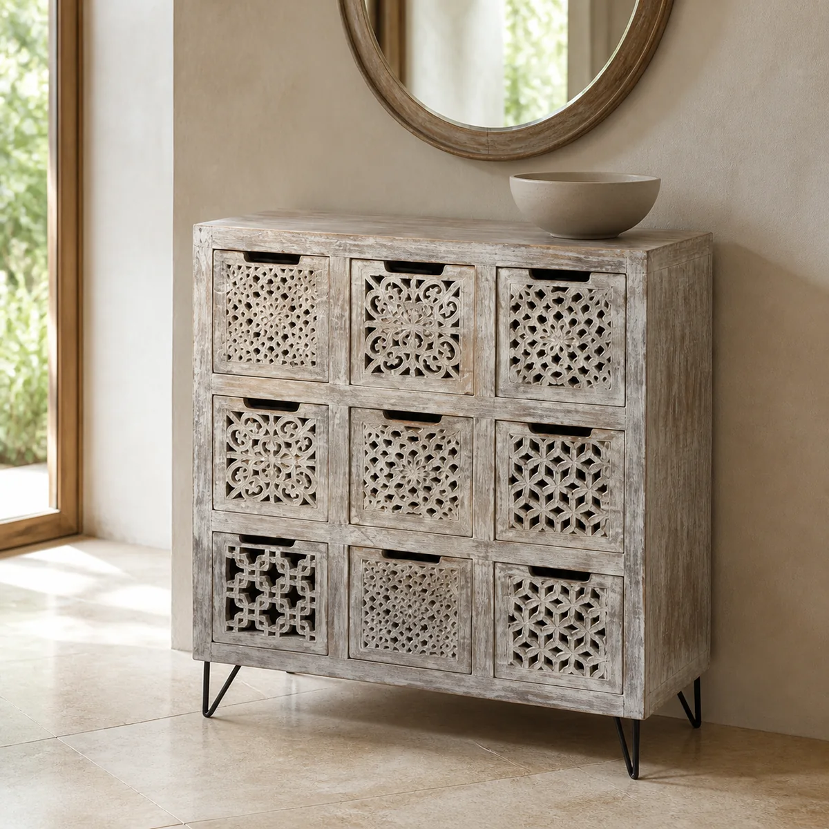 Oshana Carved Nine-Drawer Chest staged in a curated room setting one.