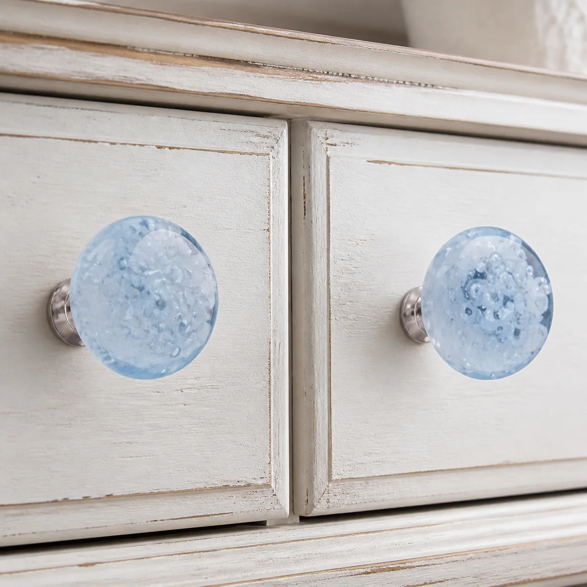 Blue Cloud Glass Cabinet Knob Pair staged in a curated room setting one.