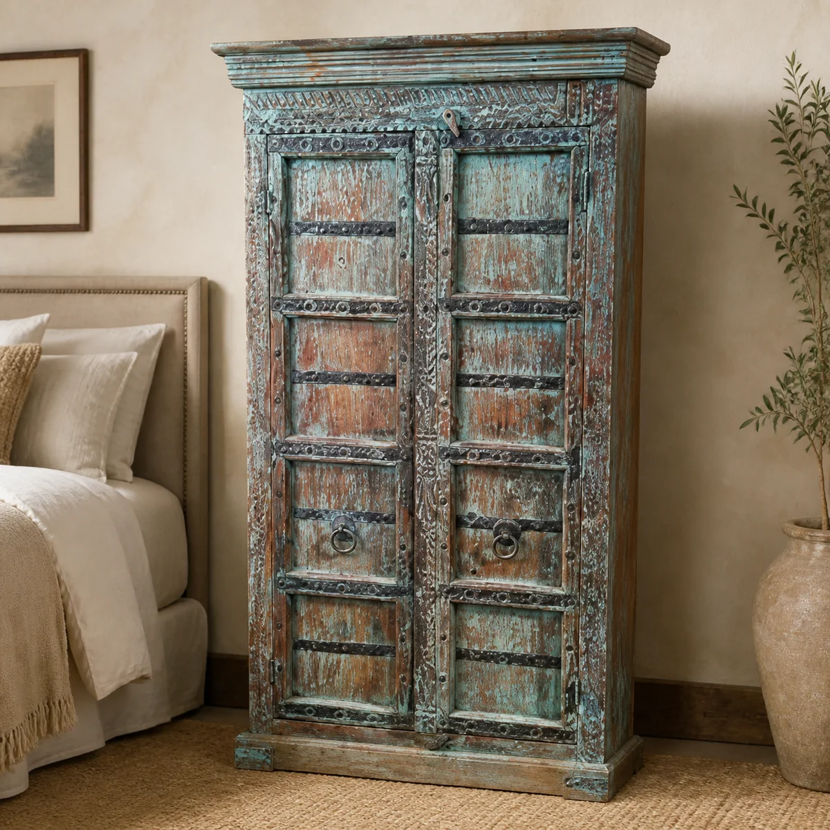 Turquoise Caravan Door Cabinet staged in a curated room setting one.