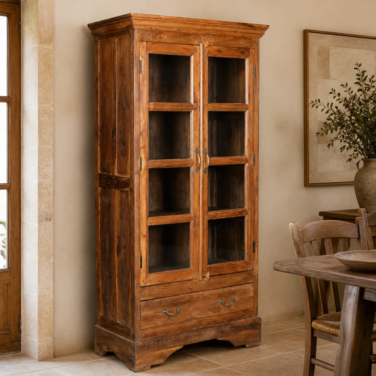 Mariental Glass Display Cupboard staged in a curated room setting one.