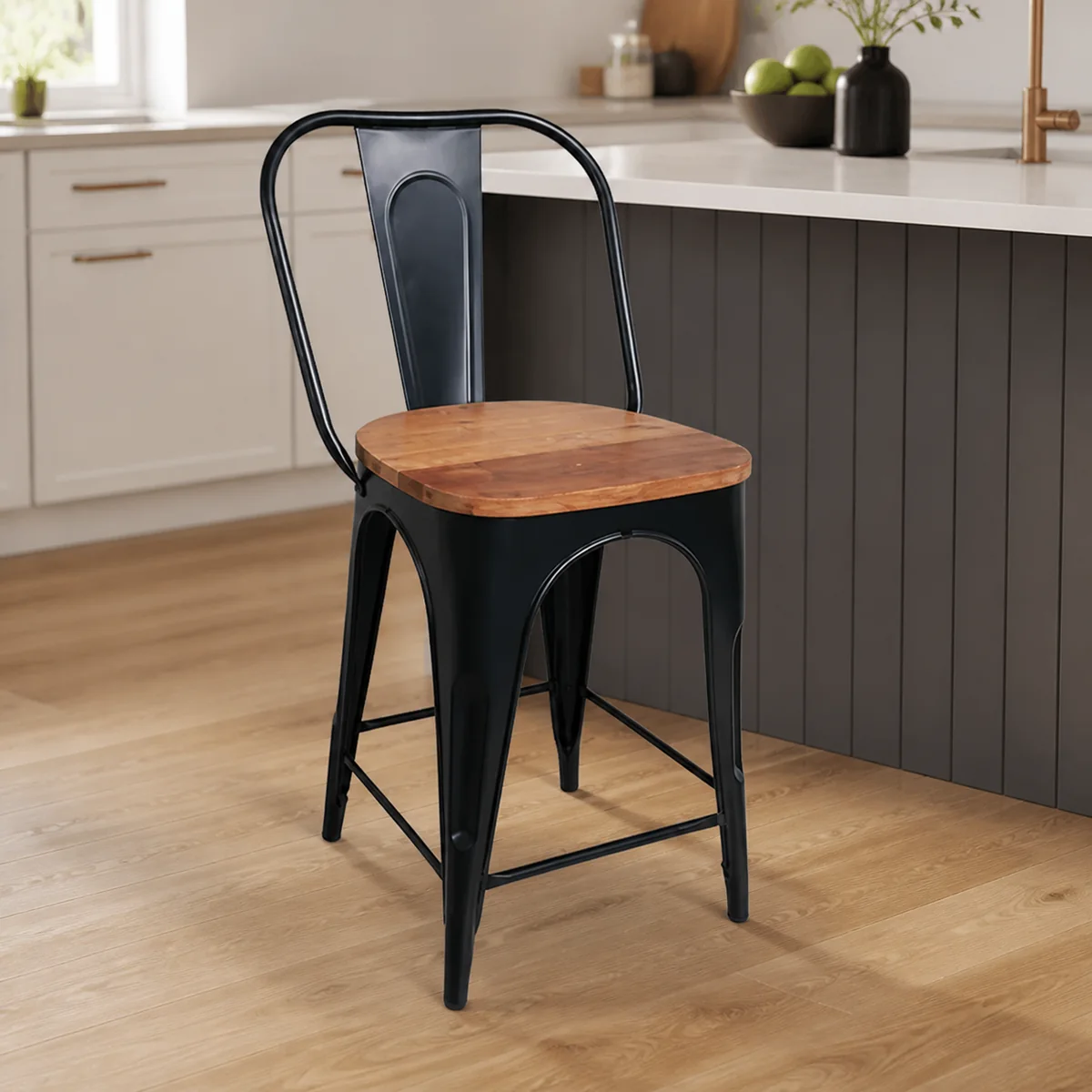 Rivet Black Counter Chair staged in a curated room setting one.