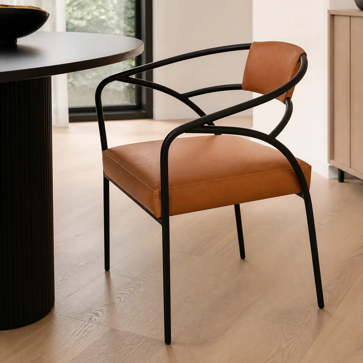 Sable Loop-Arm Dining Chair staged in a curated room setting one.