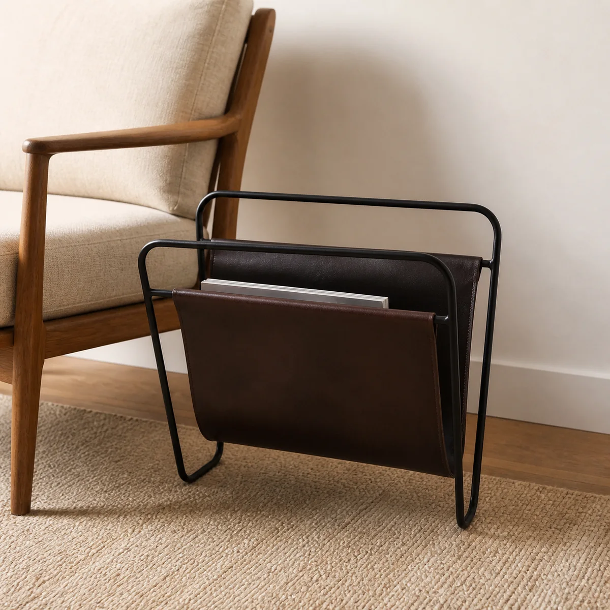 Sable Leather Magazine Rack staged in a curated room setting one.