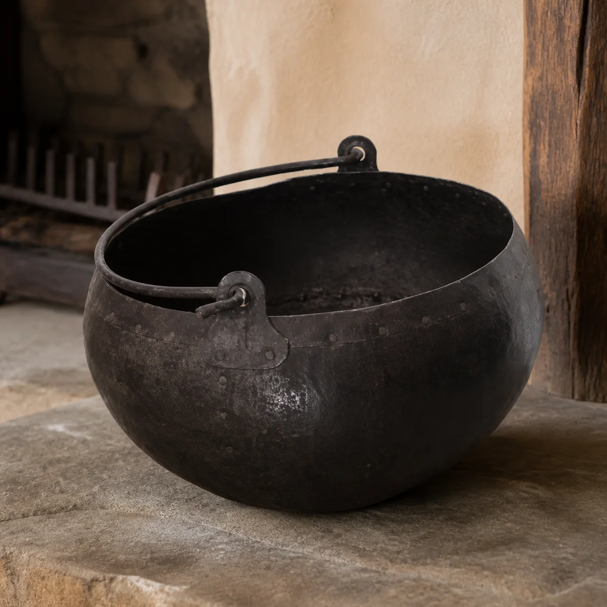 Campfire Cauldron Bucket staged in a curated room setting one.