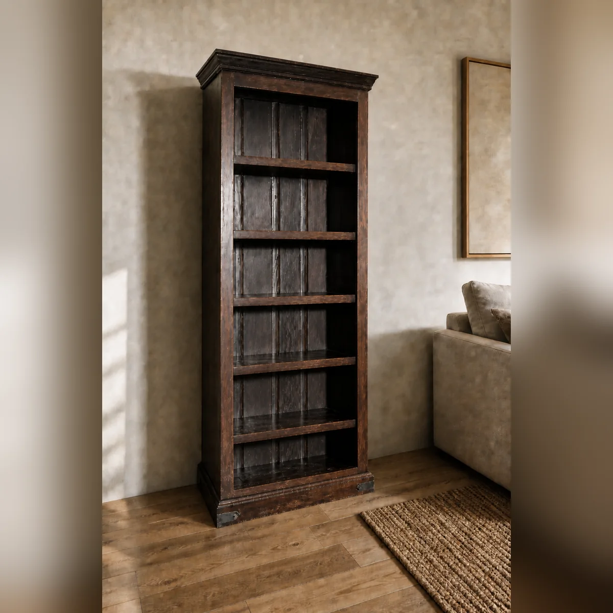 Mahango Darkwood Bookcase staged in a curated room setting one.