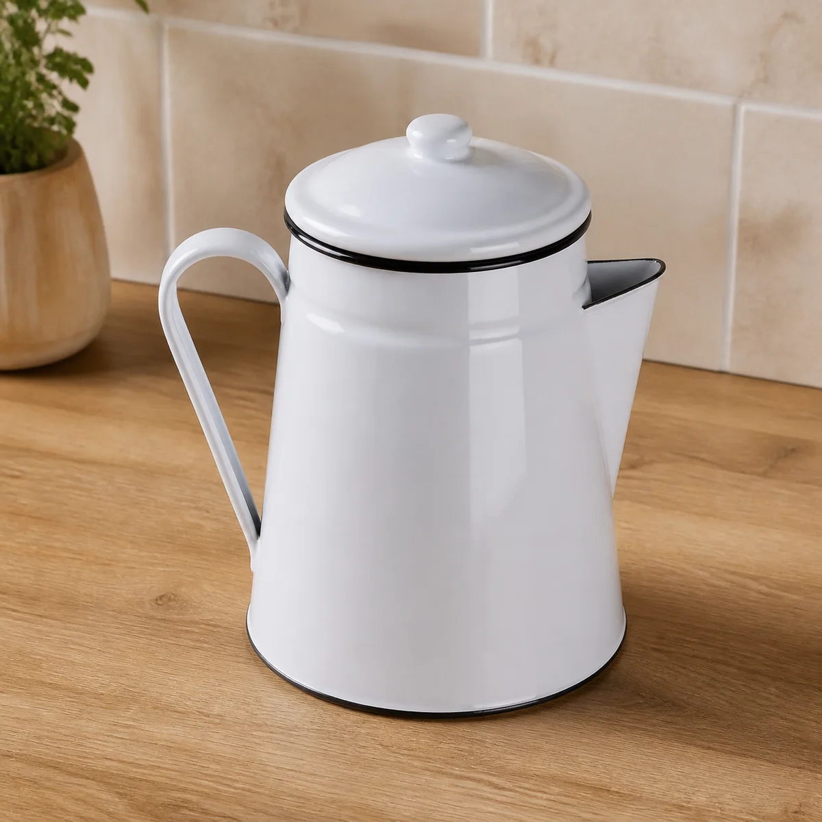 White Enamel Coffee Pot staged in a curated room setting one.