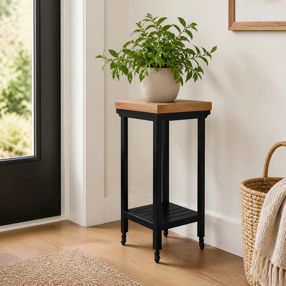 Foundry Tall Plant Stand staged in a curated room setting one.
