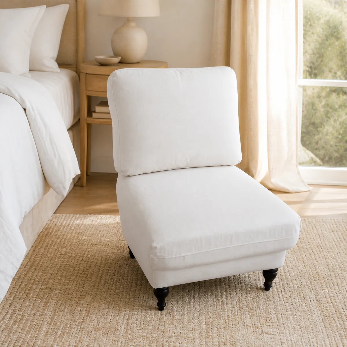 Linen Slipper Chair staged in a curated room setting one.