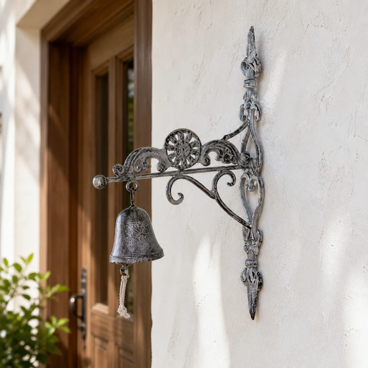 Silver Wheel-Bracket Door Bell staged in a curated room setting one.