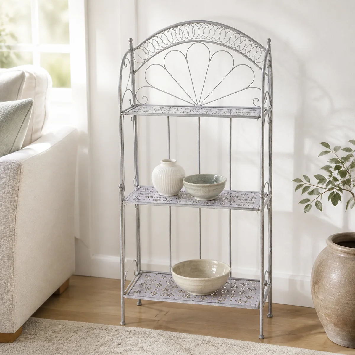Silver Fanback Display Rack staged in a curated room setting one.