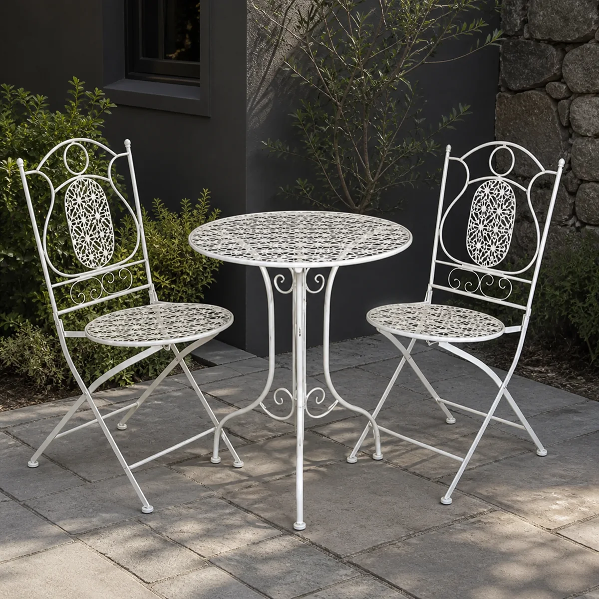 Medallion Garden Bistro Set staged in a curated room setting one.