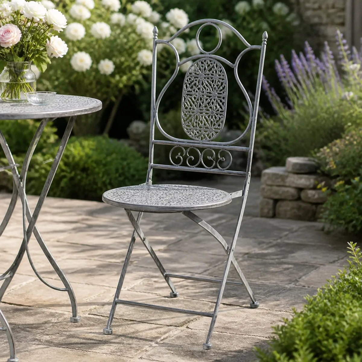 Silver Medallion Garden Chair staged in a curated room setting one.