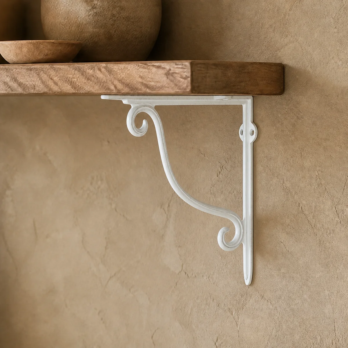 Ivory Scroll Wall Bracket staged in a curated room setting one.