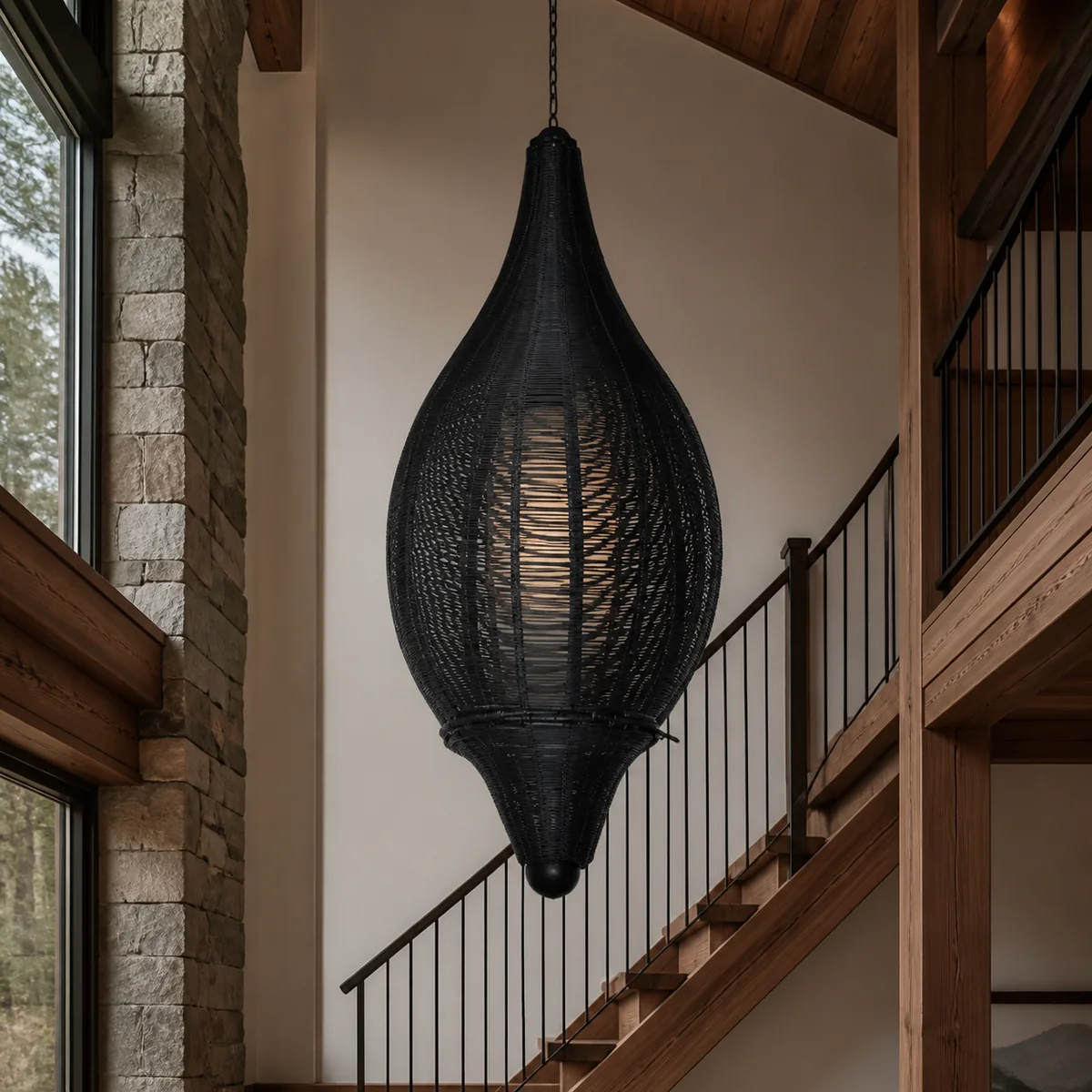 Midnight Ribbed Lantern Pendant staged in a curated room setting one.