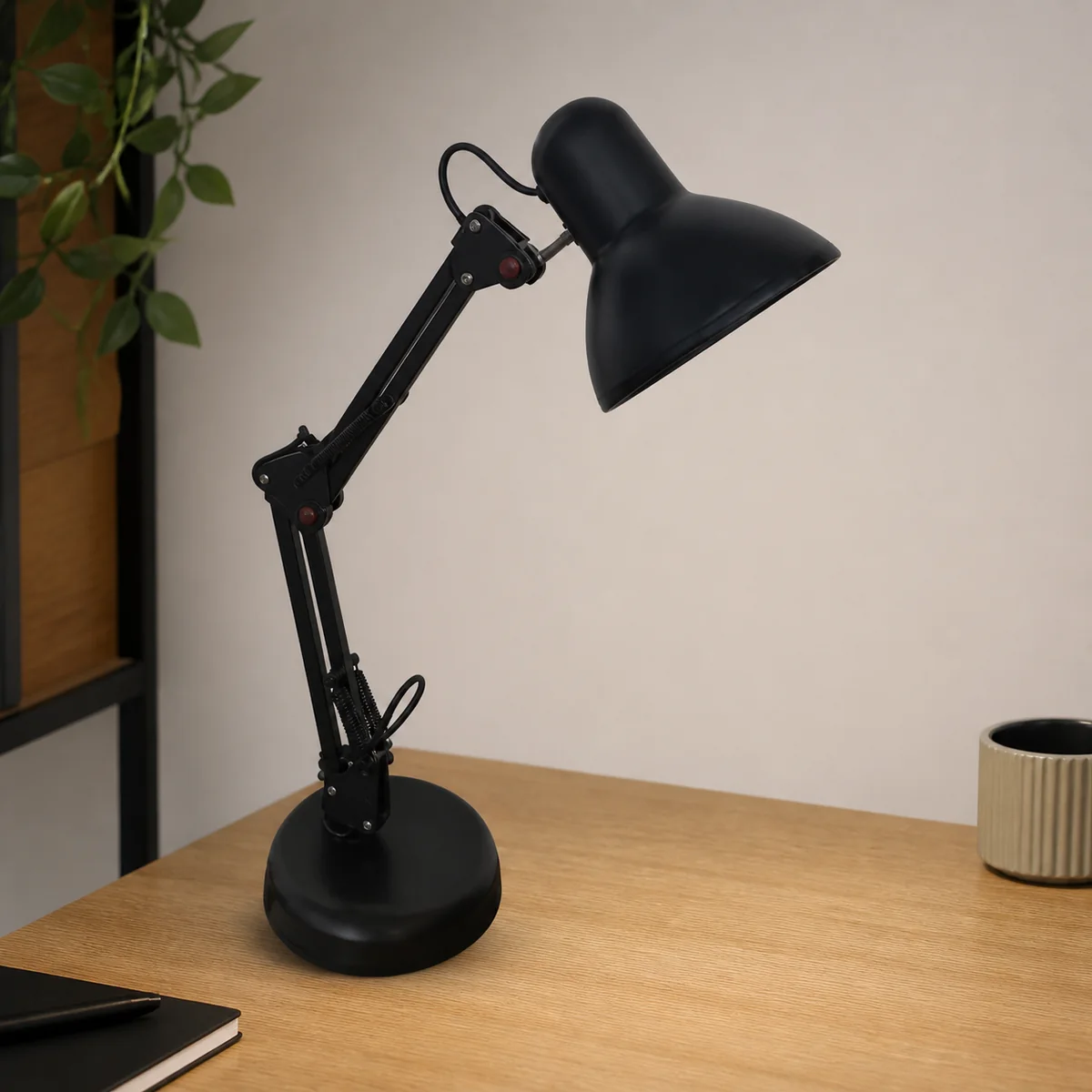 Midnight Anglepoise Desk Lamp staged in a curated room setting one.
