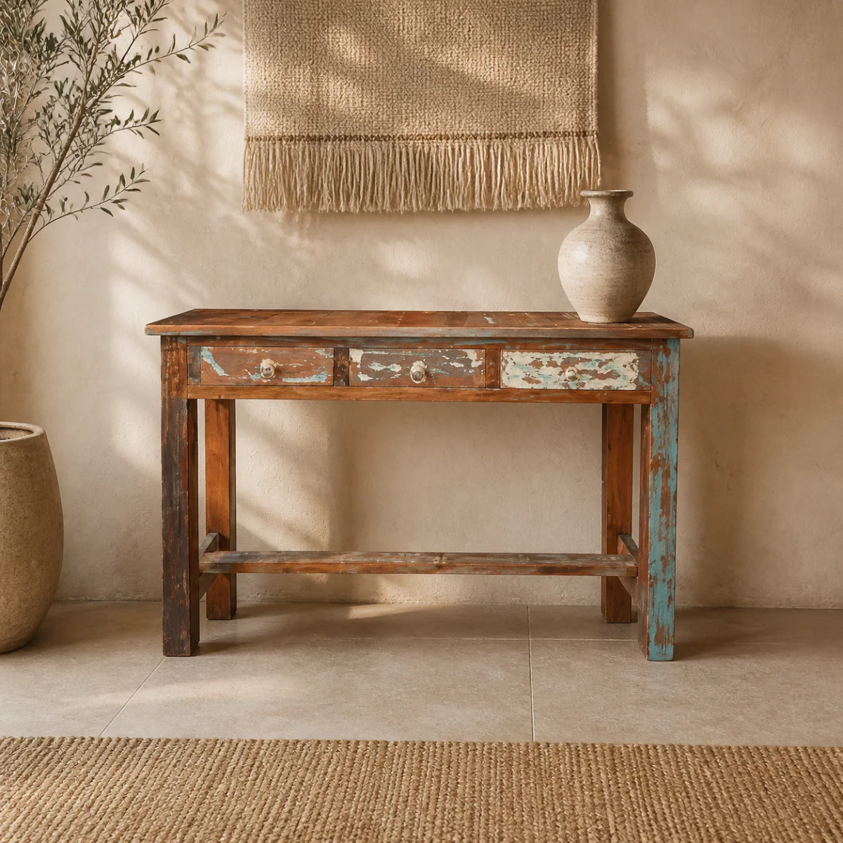 Thar Patina Console staged in a warm plaster entry hall.