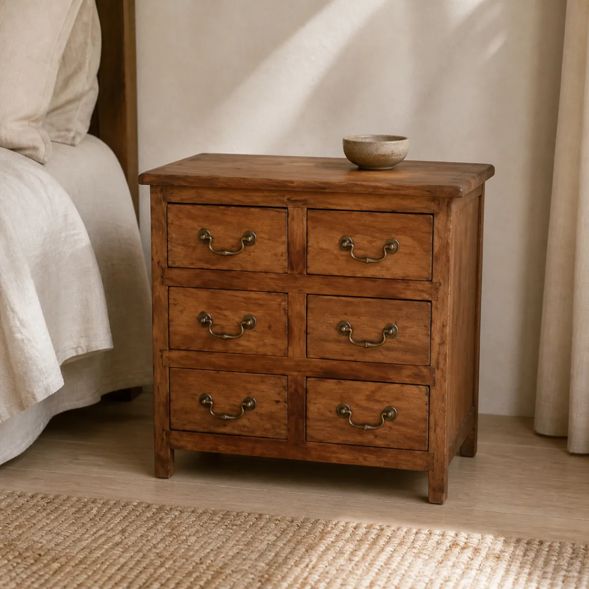 Amber Six-Drawer Chest staged in a calm bedroom.
