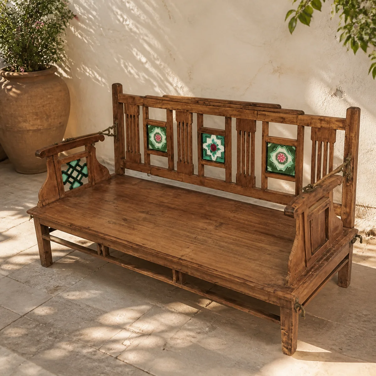 Mosaic Courtyard Bench staged in a sunlit courtyard.